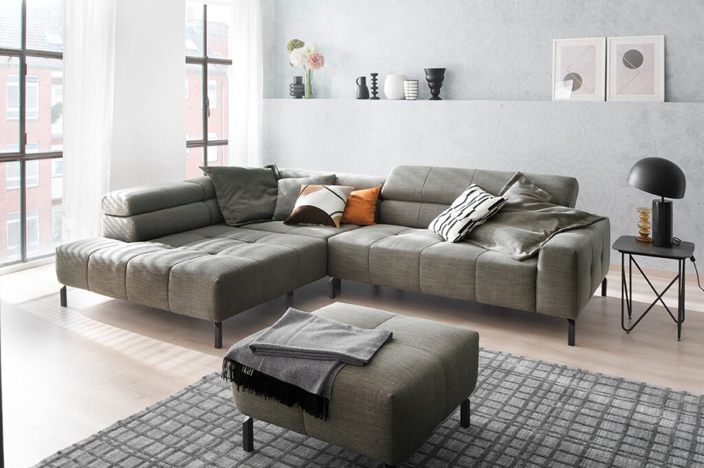 salon ponsaerts meubelen diep hoeksalon design grijs poef